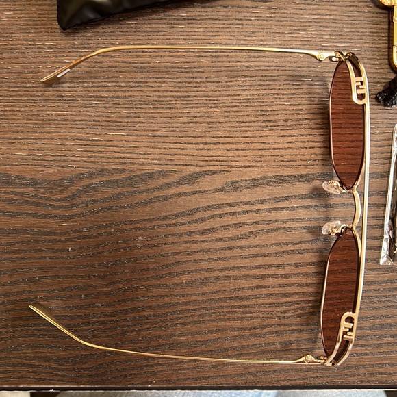 Fendi Hexagonal O’Lock sunglasses. Gold frame and Pink/Purple Lense - Picture 2 of 9